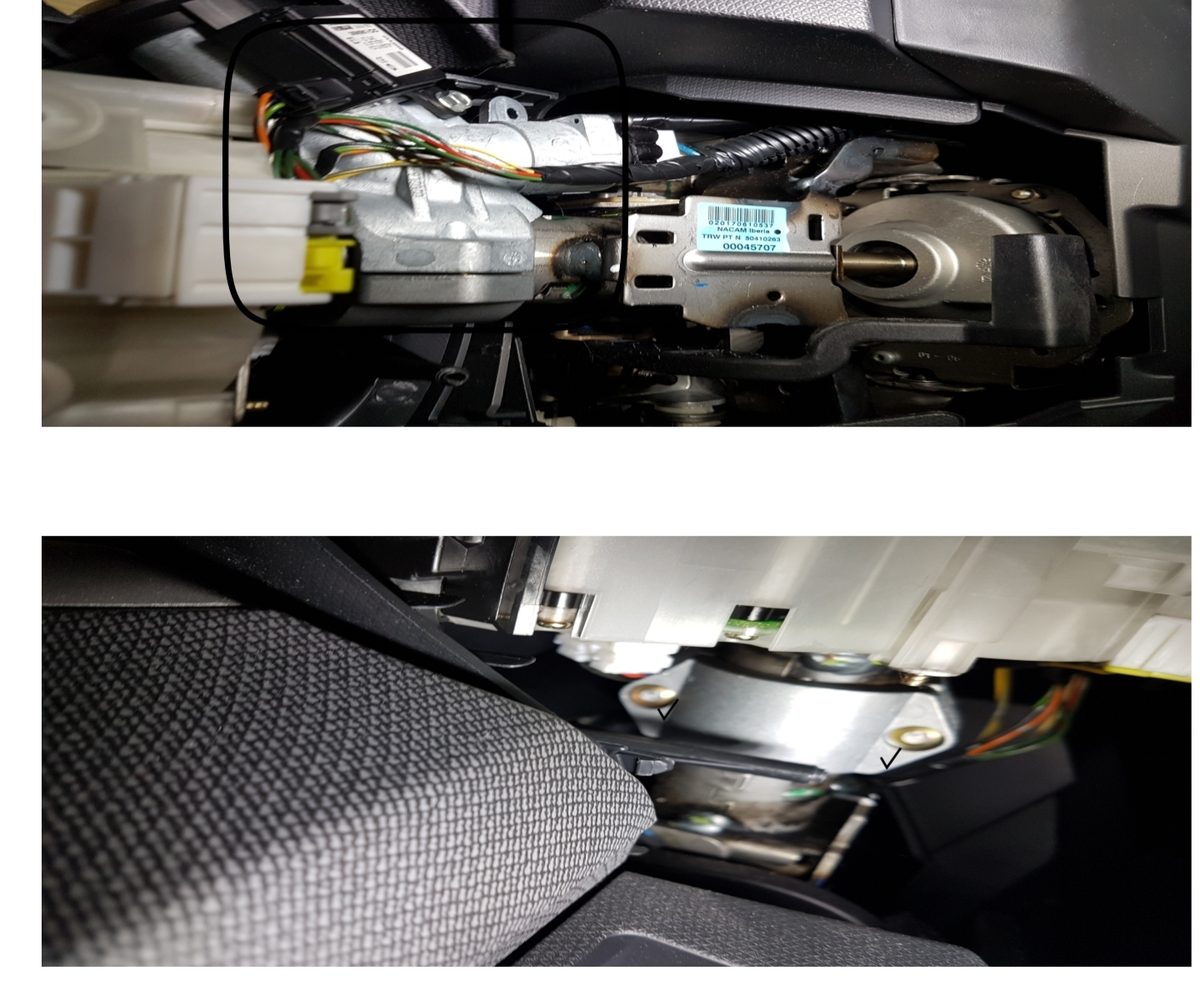 Freigelegtes Lenkradschloss im Nissan Micra mit den drei Kabelsteckern